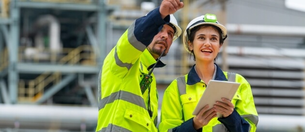 Technicians in oil and gas facilities working safely with onsite nitrogen systems